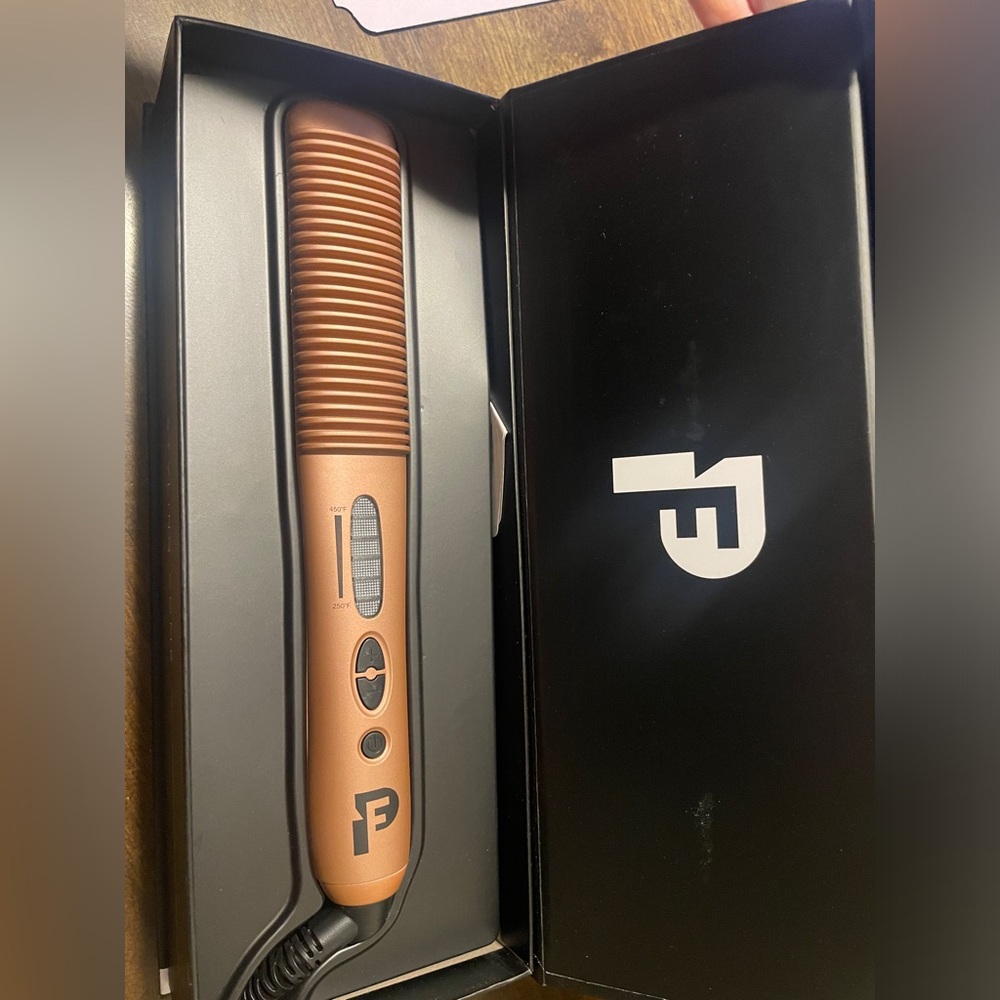 Profashion styling comb. Styles hair for blowout look, straightens, and curls!